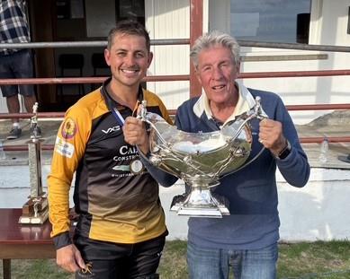 Lawrenny skipper Troy Purslowe receives the magnificent Bowl from Mr Hugh Harrison-Allen